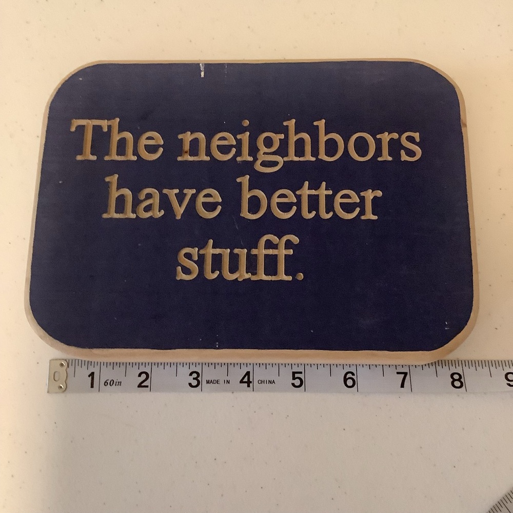 Blue Decorative Sign with Humorous Quote